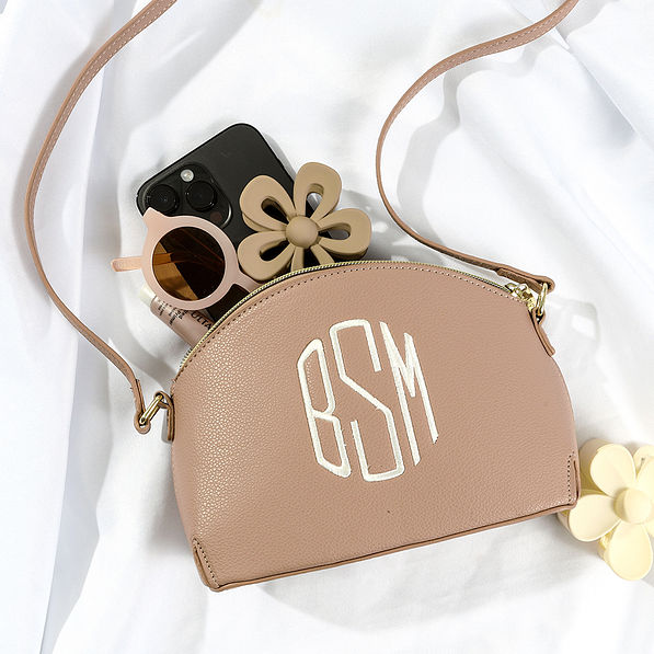 spill shot with tan youth crossbody purse