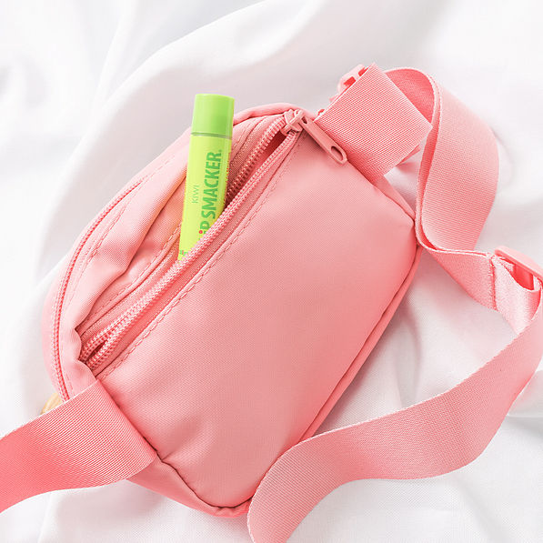 back of coral monogrammed belt bag with pocket