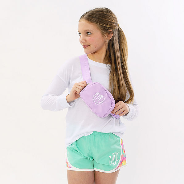 blakely wearing lavender belt bag and shorts