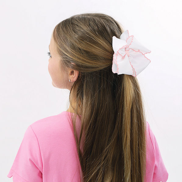 white hair bow on little girl