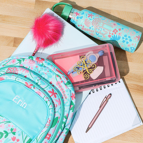 pink kids monogrammed pencil box with mint blossom water bottle and backpack
