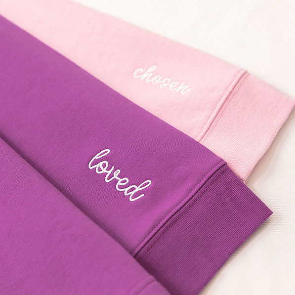 close up of loved and chosen embroidery detail on faith pullover