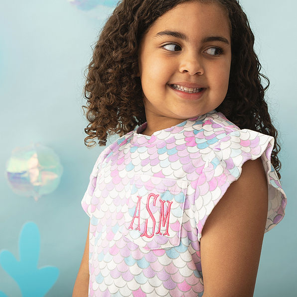 close up of kids monogrammed nightgown in mermaid