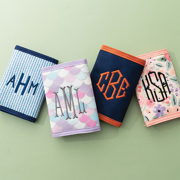 4 kids wallet group flatlay green