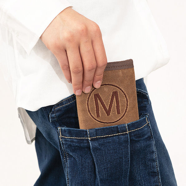 brown kids wallet in pocket