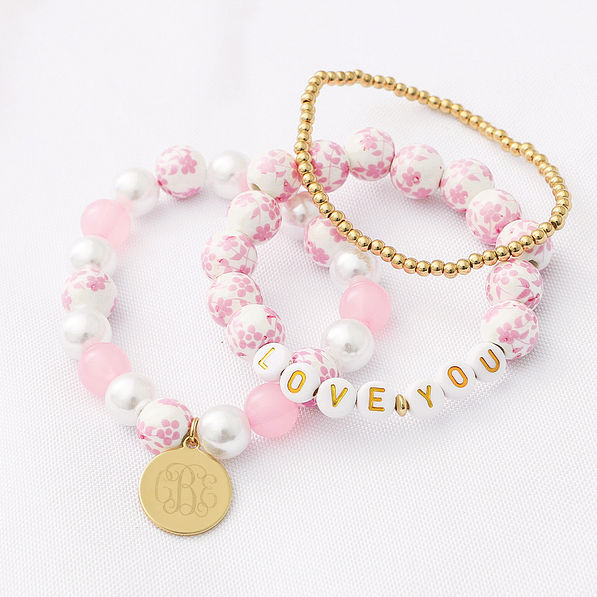 love you girls monogrammed bracelets in pink and gold