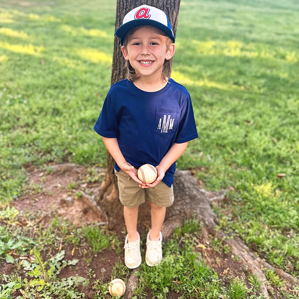 navy short sleeve shirt with baseball