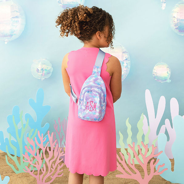 mermaid magic kids sling backpack on back