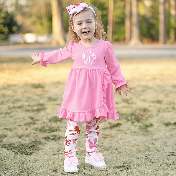 little girl wearing pink bows monogrammed ruffle legging tunic set