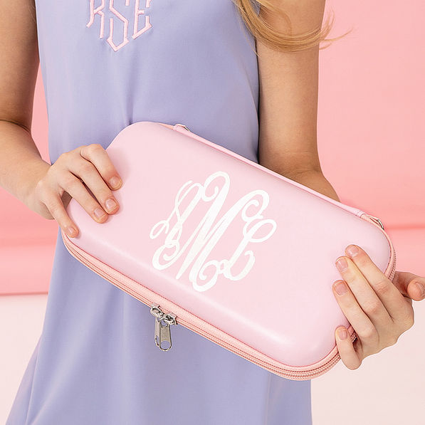 girl holding pink personalized nintendo switch gaming case