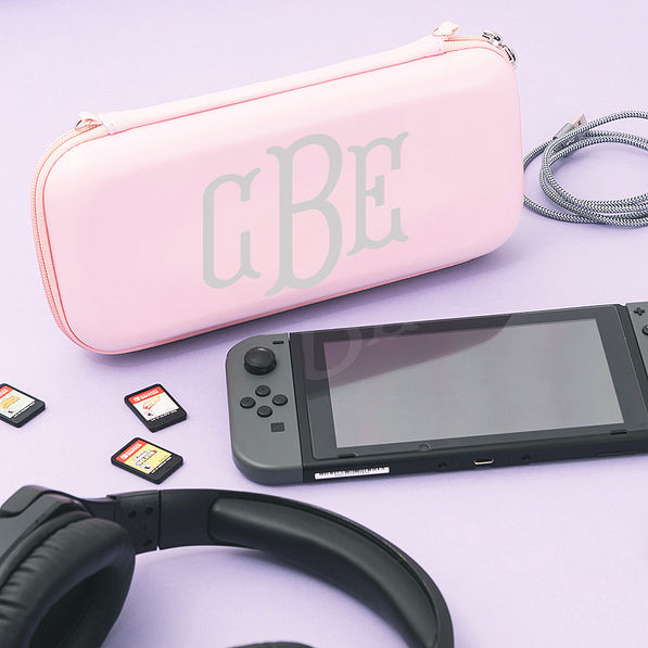 monogrammed pink game travel case with games and cord