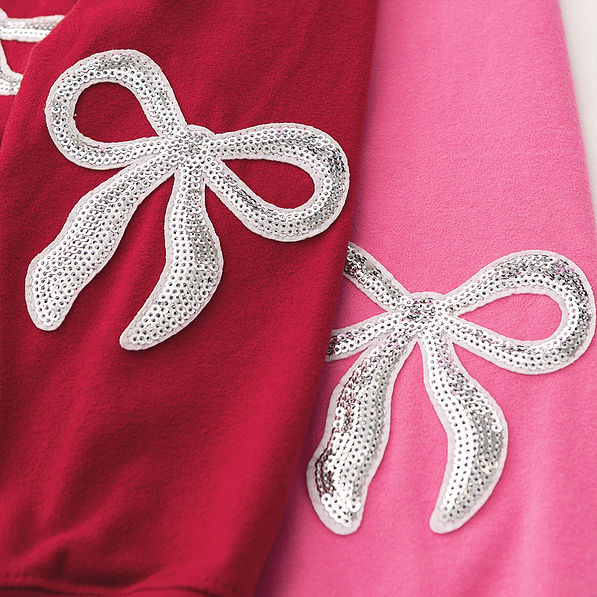 crimson and hot pink kids sequin bow sweatshirt detail shot
