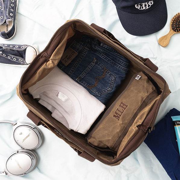 dark brown kids waxed canvas overnight bag inside shot