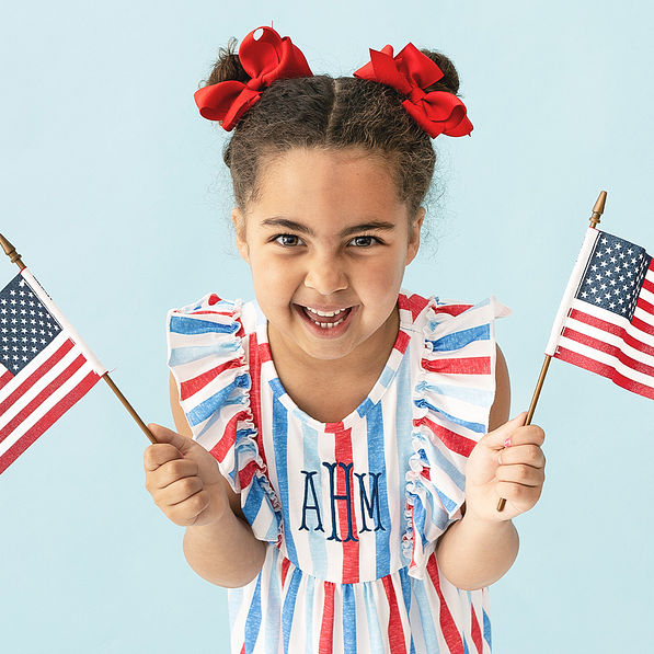 close up of americana monogrammed ruffle knit dress