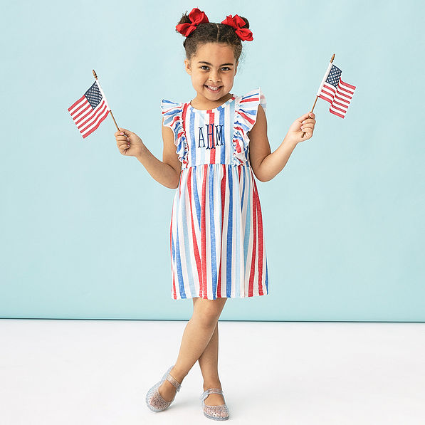 girl wearing america usa stripes ruffle knit monogrammed dress