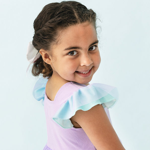 close up of ruffle sleeves on girls twirl dress