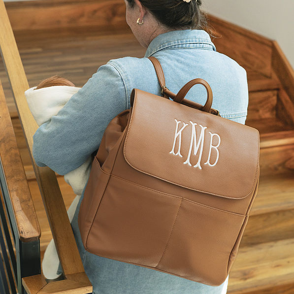 girl with personalized diaper backpack purse on back