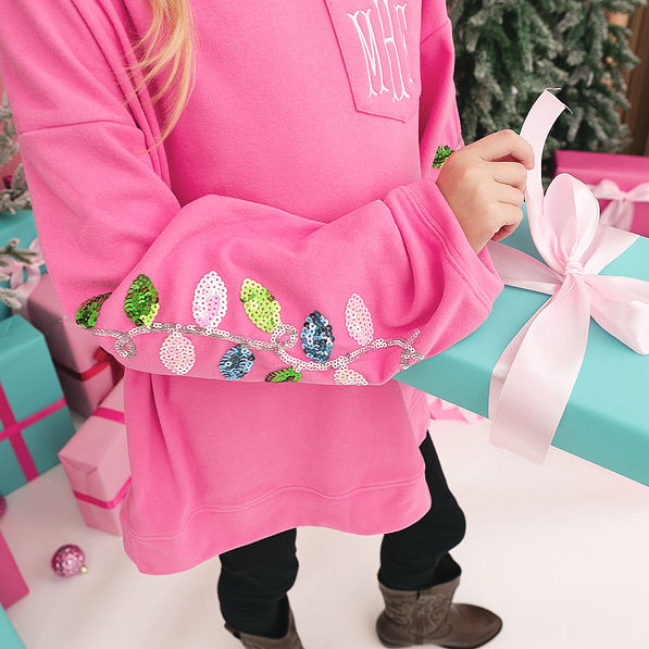 christmas sweatshirt in hotpink close shot