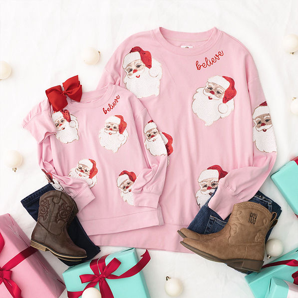 light pink christmas sweatshirt mom and me flatlay