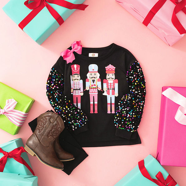 black nutcracker sweatshirt flatlay