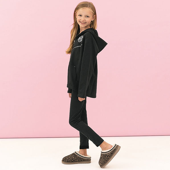 girl wearing black full zip hoodie side