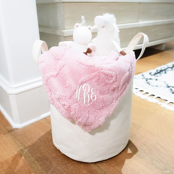 pink kids bow blanket in basket