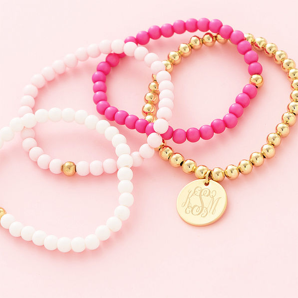 girls pink beaded bracelet stack flatlay