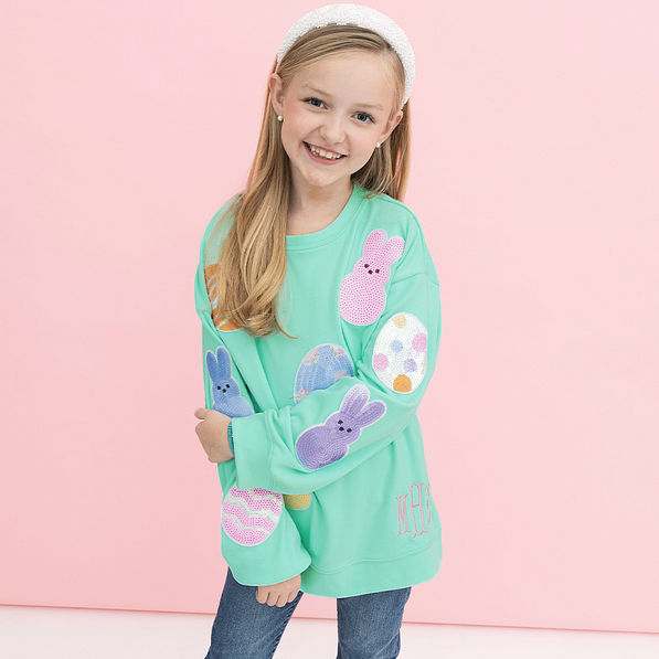 girl wearing personalized kids easter sweatshirt