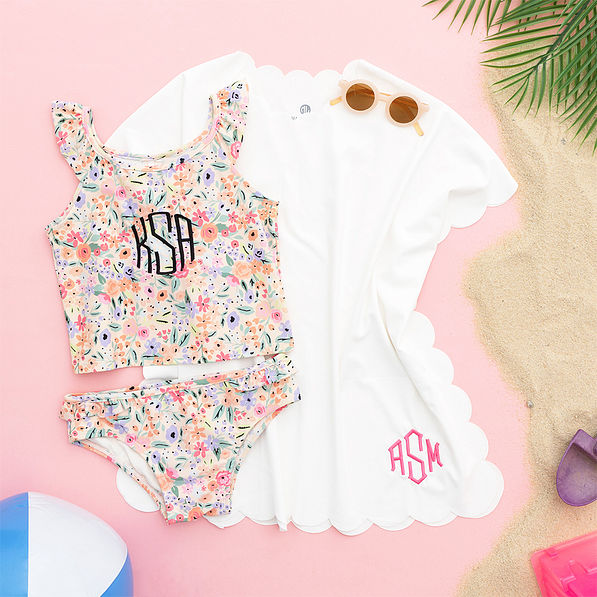 white scalloped cover up flatlay