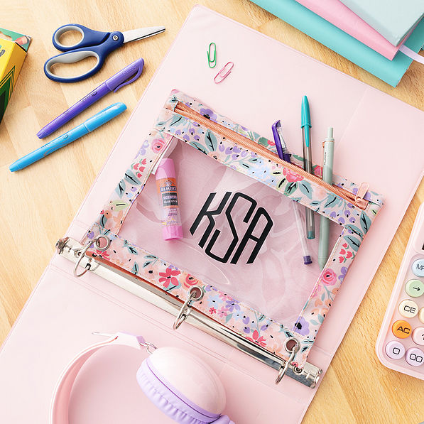 close up of personalized coral floral binder pouch