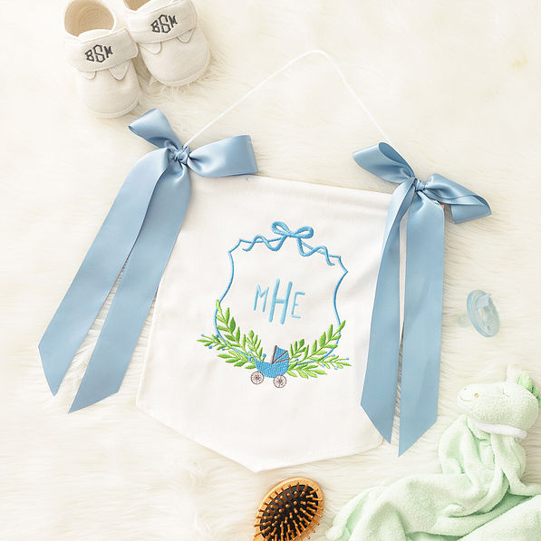 blue new baby banner flatlay