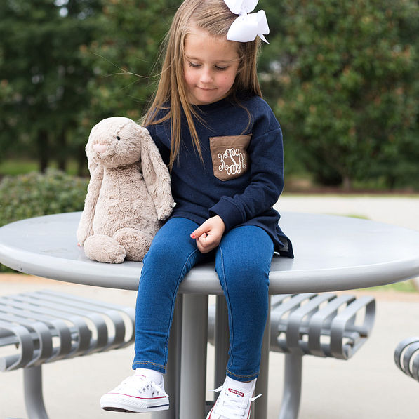 cute girl in navy sweatshirt