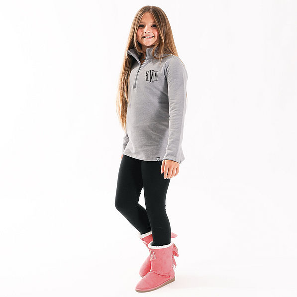 studio shot of youth girl in gray pullover