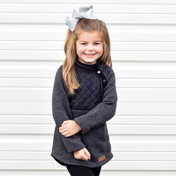 youth girl wearing charcoal snap pullover