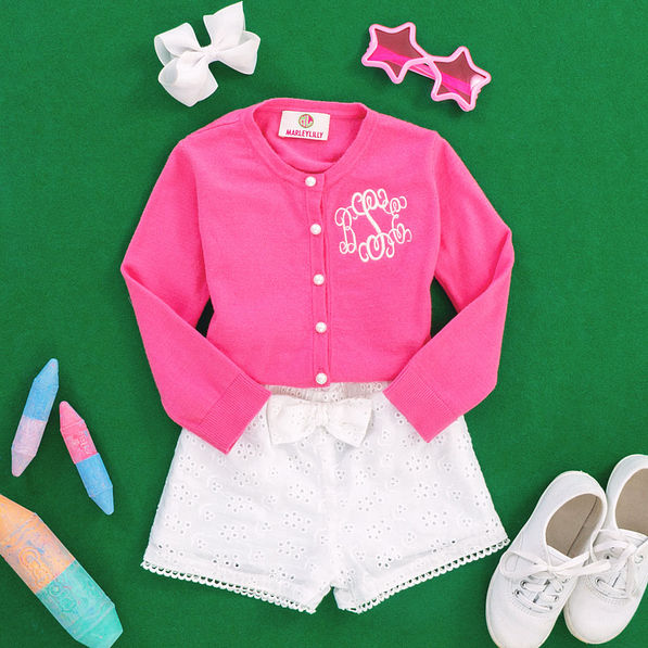 pink monogrammed kids cardigan with white shorts and chalk