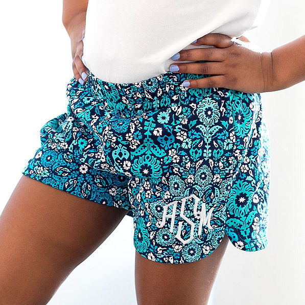 close up of girls pull on shorts