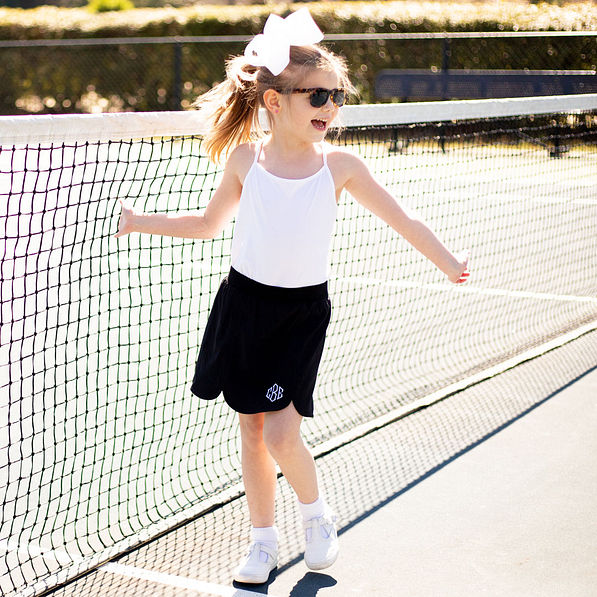monogrammed skort at tennis court