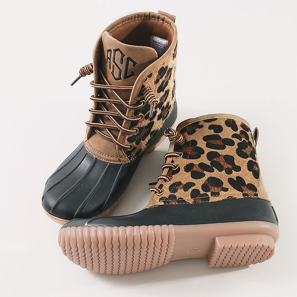 studio shot of leopard spots duck boots