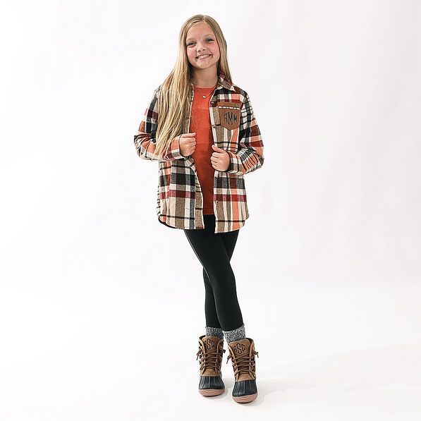 youth girl wearing leopard spots duck boots
