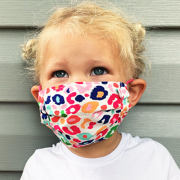 cute girl in pink mask