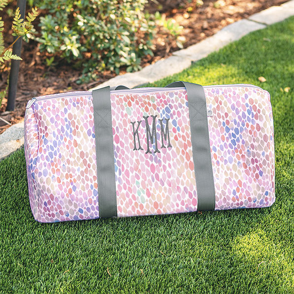 monogrammed youth watercolor duffel bag in grass
