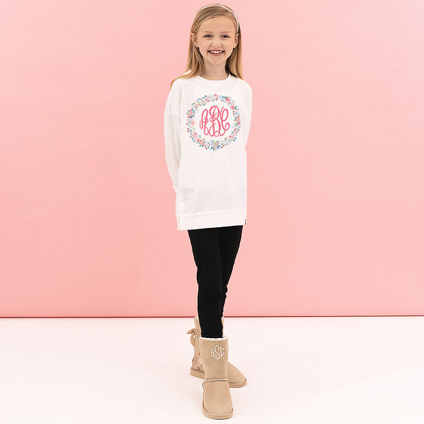 girl wearing coral floral personalized kids crewneck sweatshirt