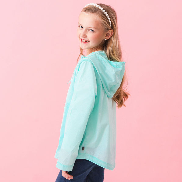 mint kids lightweight rain jacket on addie - side view