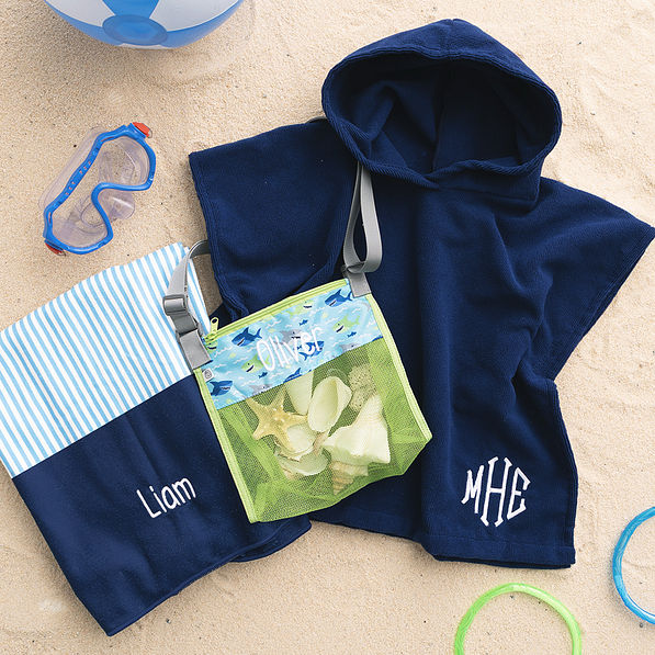 monogrammed kids beach towel in blue mini stripes with seashell bag and poncho