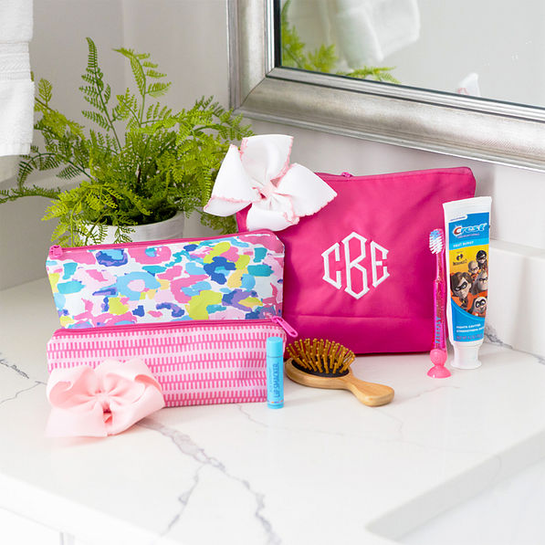 monogrammed kids toiletry bag MLEO in bathroom