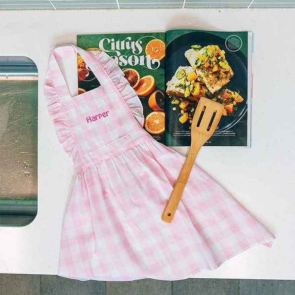 girls gingham apron with cookbook