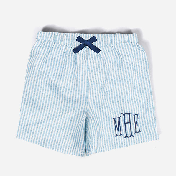 monogrammed kids swim trunks in navy seersucker