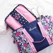 navy rainbow hearts packing bag with weekend bag