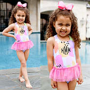 Split of Little girl wearing Tutu Bathing Suit