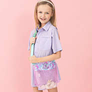 girl with mermaid monogrammed seashell bag